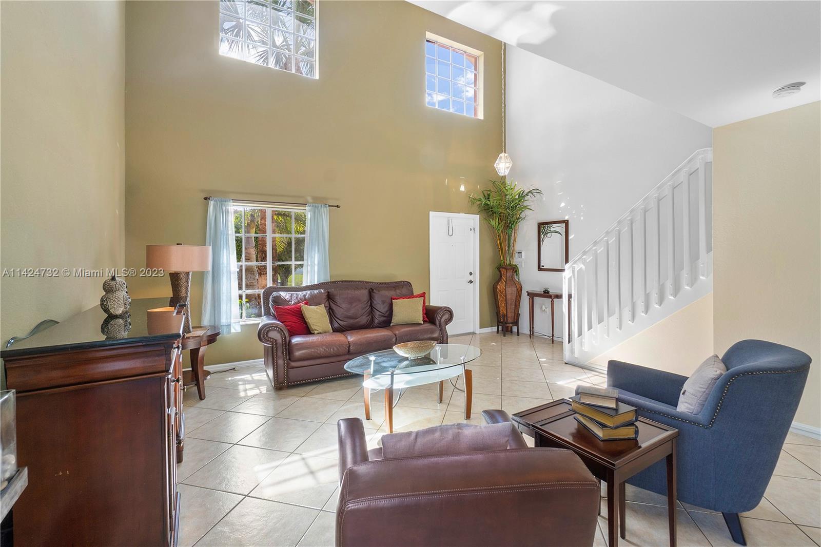 Silver Falls Miramar, FL 33027 - Photo 7 of 49 a living room with furniture and a window