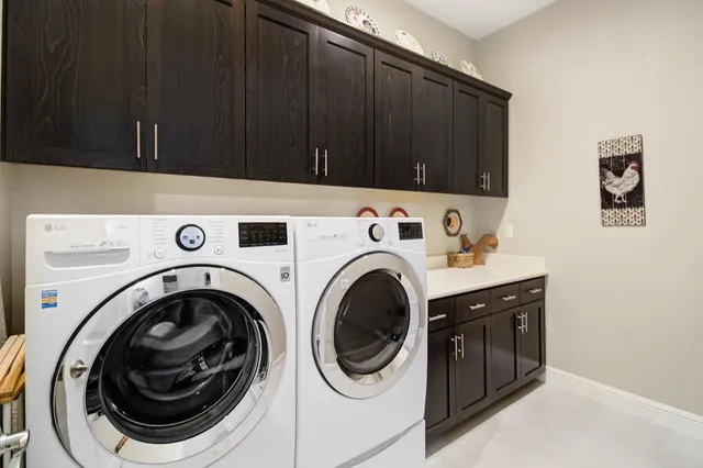 a view of a patio with table and chairs and potted plants