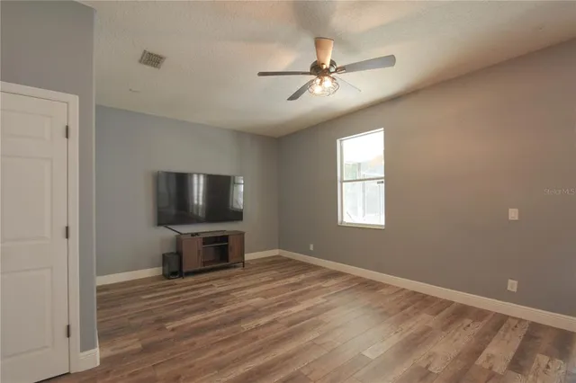 a view of a livingroom with a flat screen tv