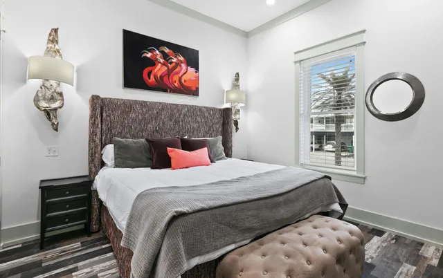 a balcony with furniture and wooden floor
