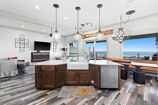 a living room with lots of furniture and a rug