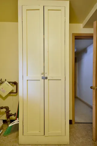 a view of a car parked in front of a house