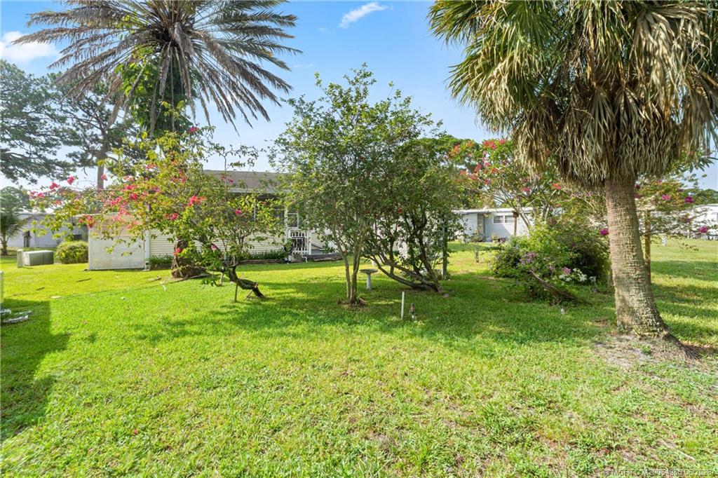 4237 4th Court Lantana, FL 33462 - Photo 35 of 40 a view of a park with a tree