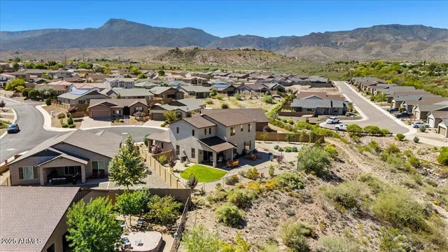 a view of a house with a mountain