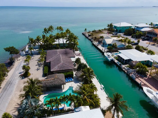 a view of a lake with a house
