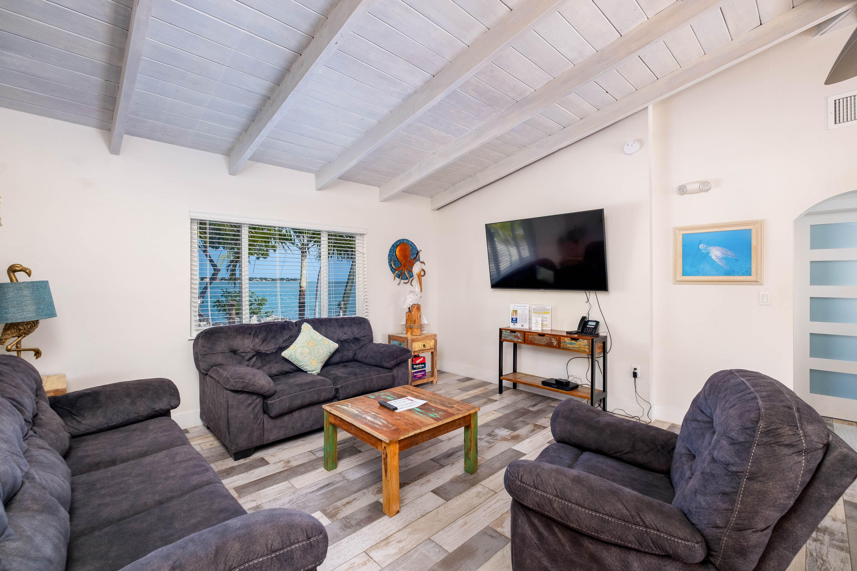 900 101st Street Marathon, FL 33050 - Photo 28 of 64 a living room with furniture and a flat screen tv