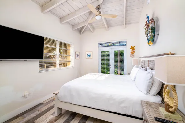 an aerial view of a house with a ocean view