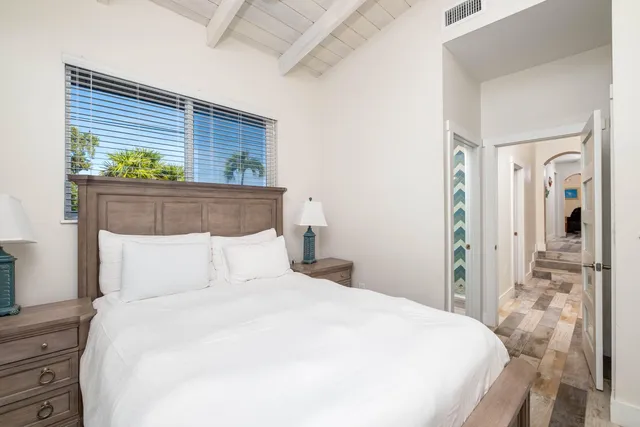 an aerial view of multiple houses with yard