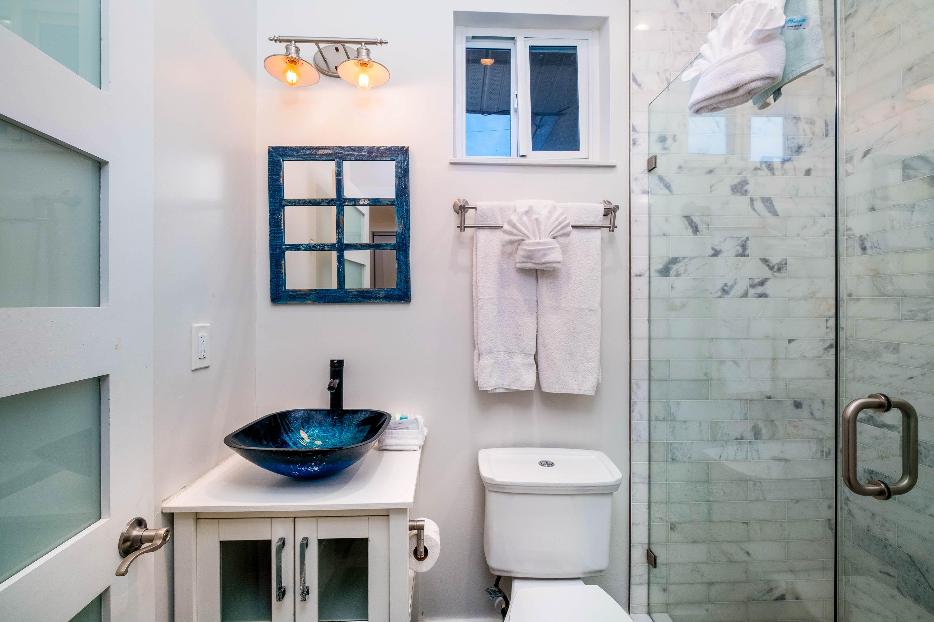 900 101st Street Marathon, FL 33050 - Photo 44 of 64 a bathroom with a toilet a sink and a shower