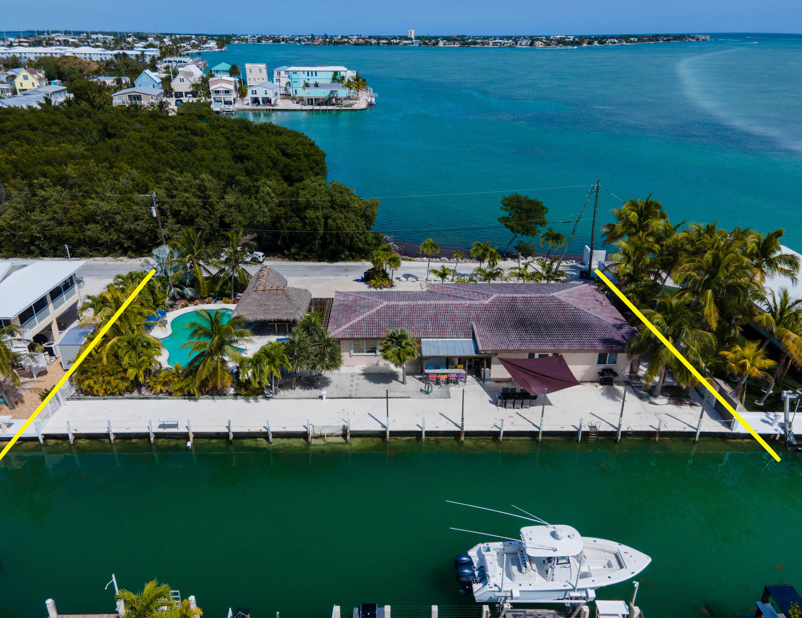900 101st Street Marathon, FL 33050 - Photo 48 of 64 an aerial view of a house with a lake view