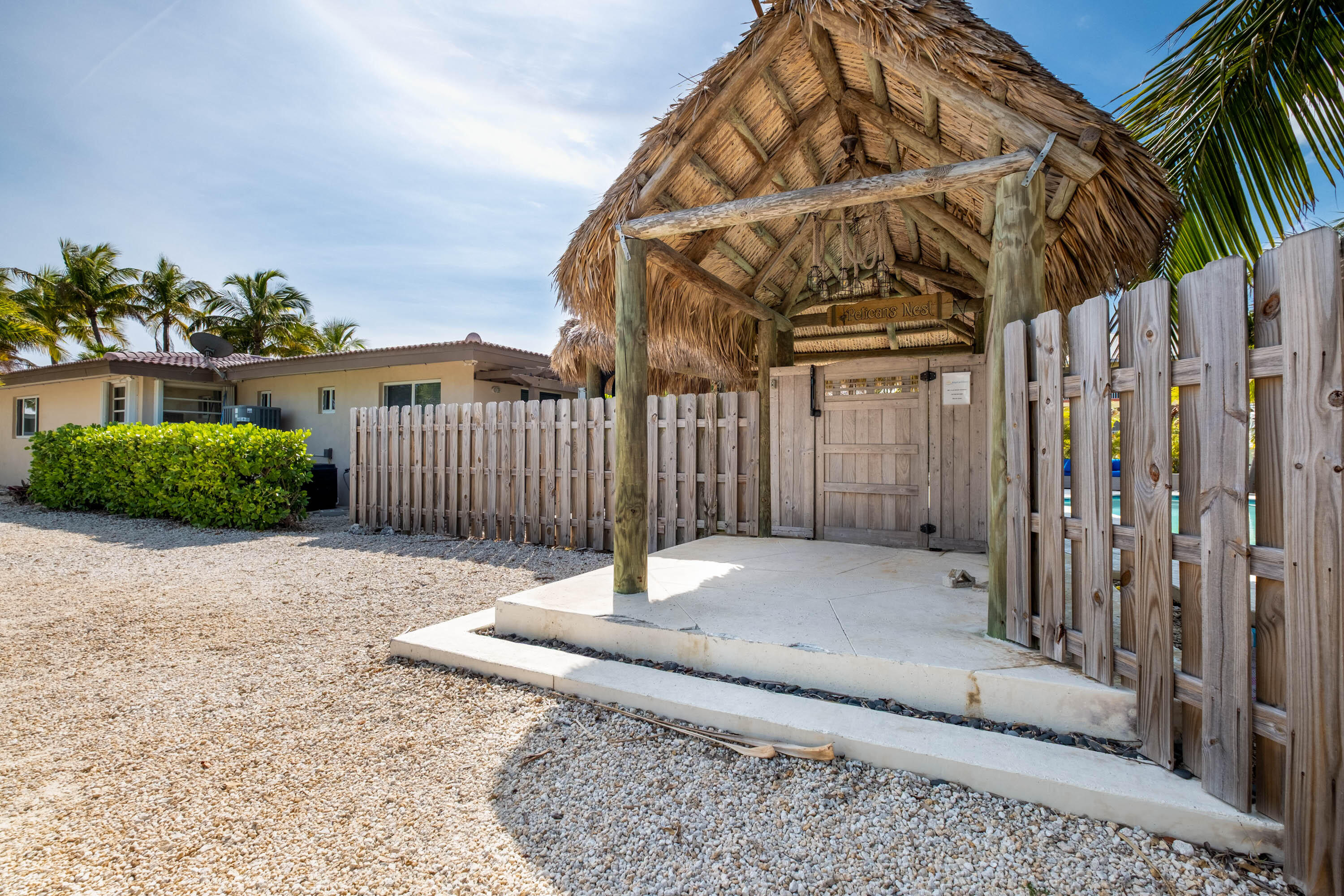 900 101st Street Marathon, FL 33050 - Photo 59 of 64 a view of a backyard with a patio