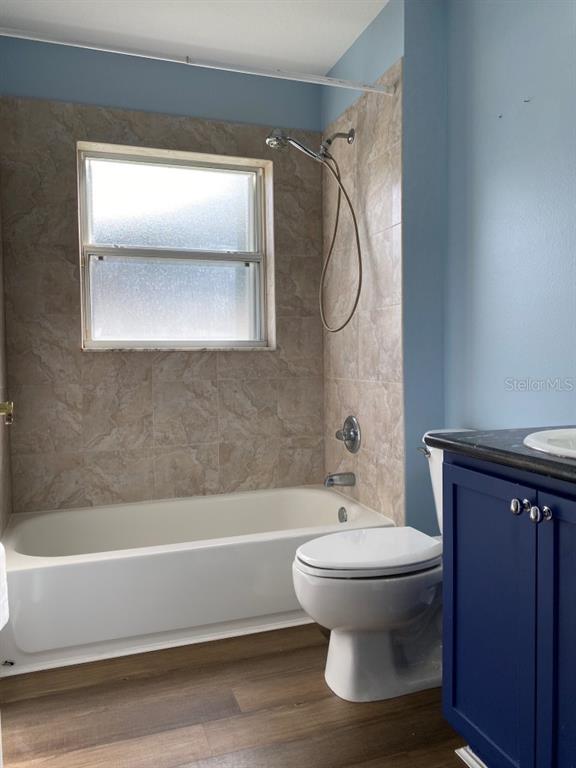 12 Prairie Lane Palm Coast, FL 32164 - Photo 11 of 41 a bathroom with a toilet and a bathtub