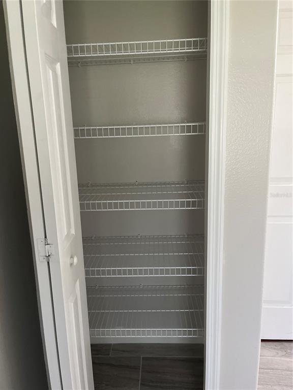 12 Prairie Lane Palm Coast, FL 32164 - Photo 12 of 41 view of walk in closet with empty racks