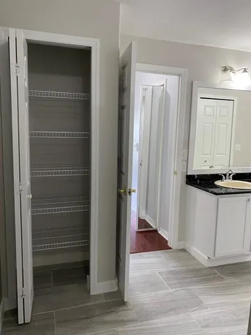 a bathroom with a toilet and a sink