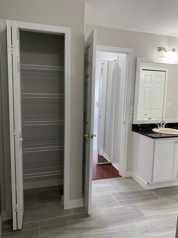 12 Prairie Lane Palm Coast, FL 32164 - Photo 27 of 41 a view of a closet area with an empty room