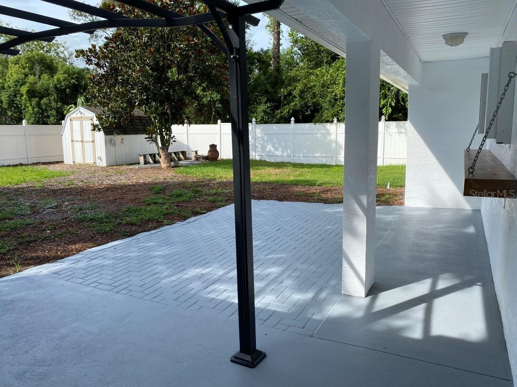 12 Prairie Lane Palm Coast, FL 32164 - Photo 32 of 41 a view of backyard with swimming pool