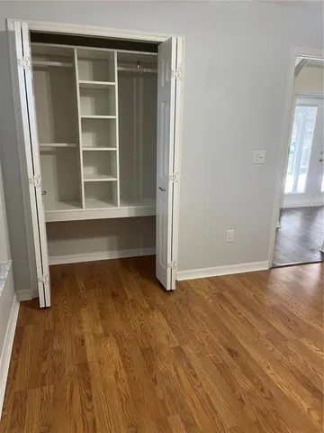 a bathroom with a toilet and a bathtub