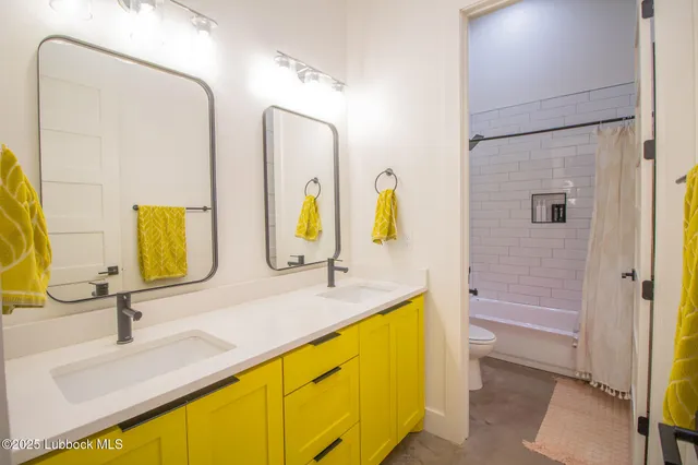 a view of a garage and car parked