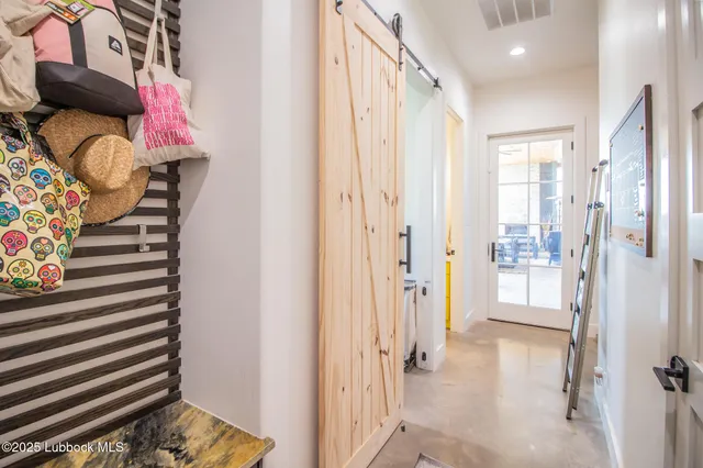 a room with furniture and a large window