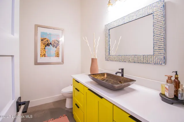 a building outdoor space with patio furniture and ocean view