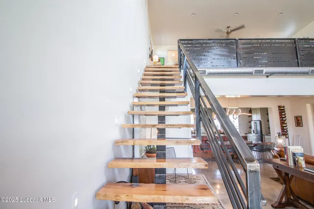 a view of a chairs and table in the patio