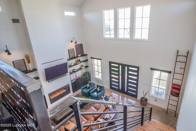 a view of a potted plants with wooden fence