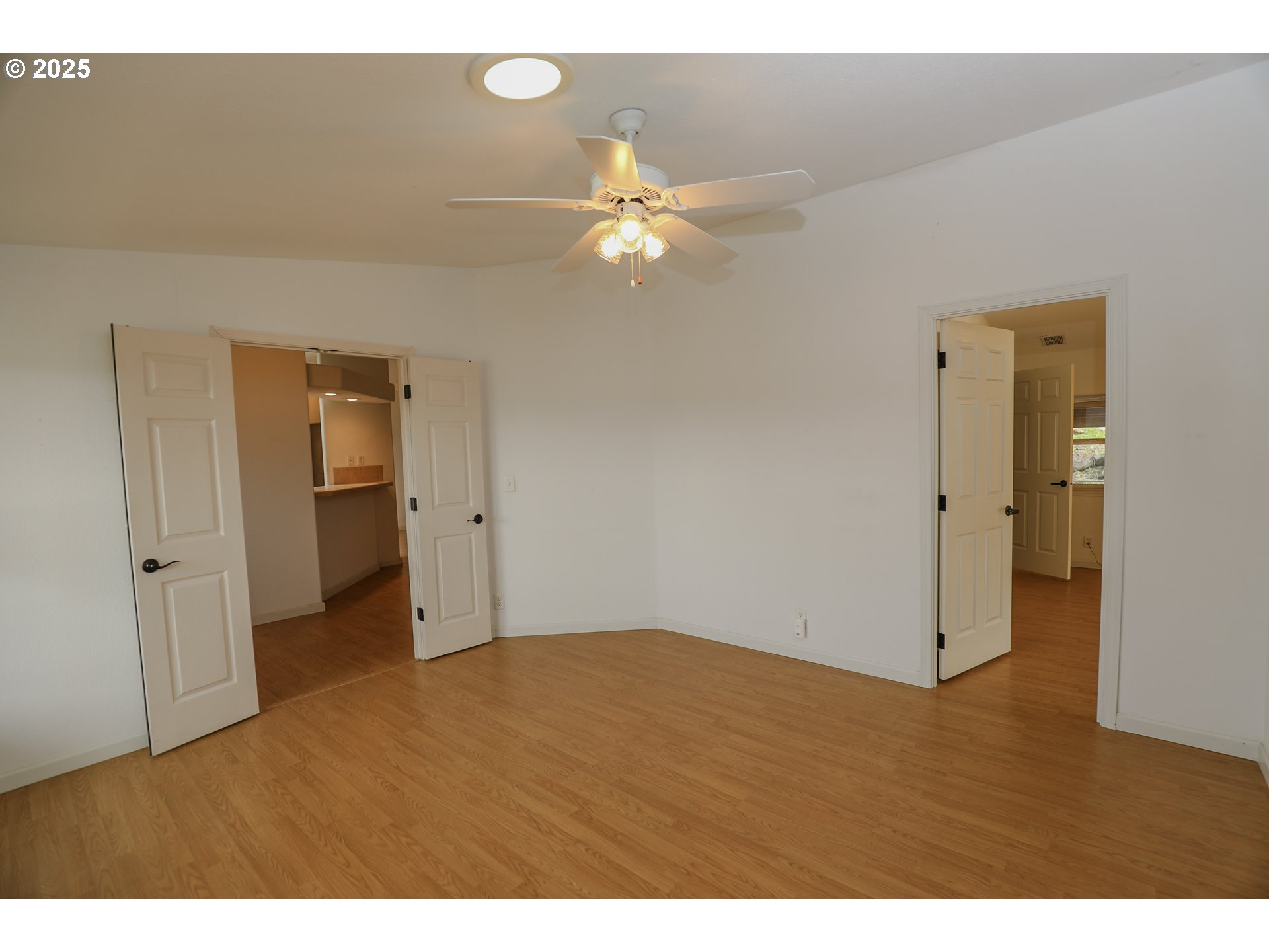 173 North Main Street Winston, OR 97496 - Photo 18 of 45 a view of empty room with wooden floor