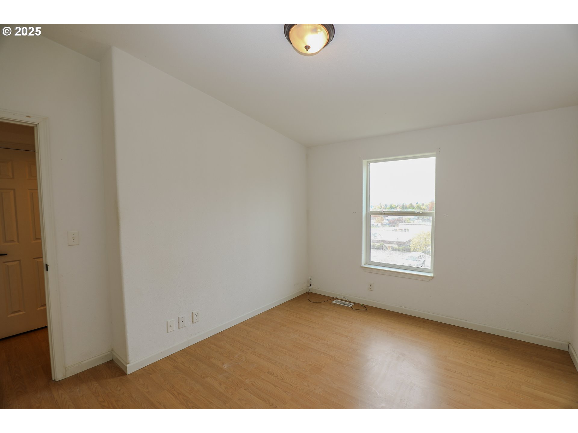 173 North Main Street Winston, OR 97496 - Photo 27 of 45 a view of an empty room with a window