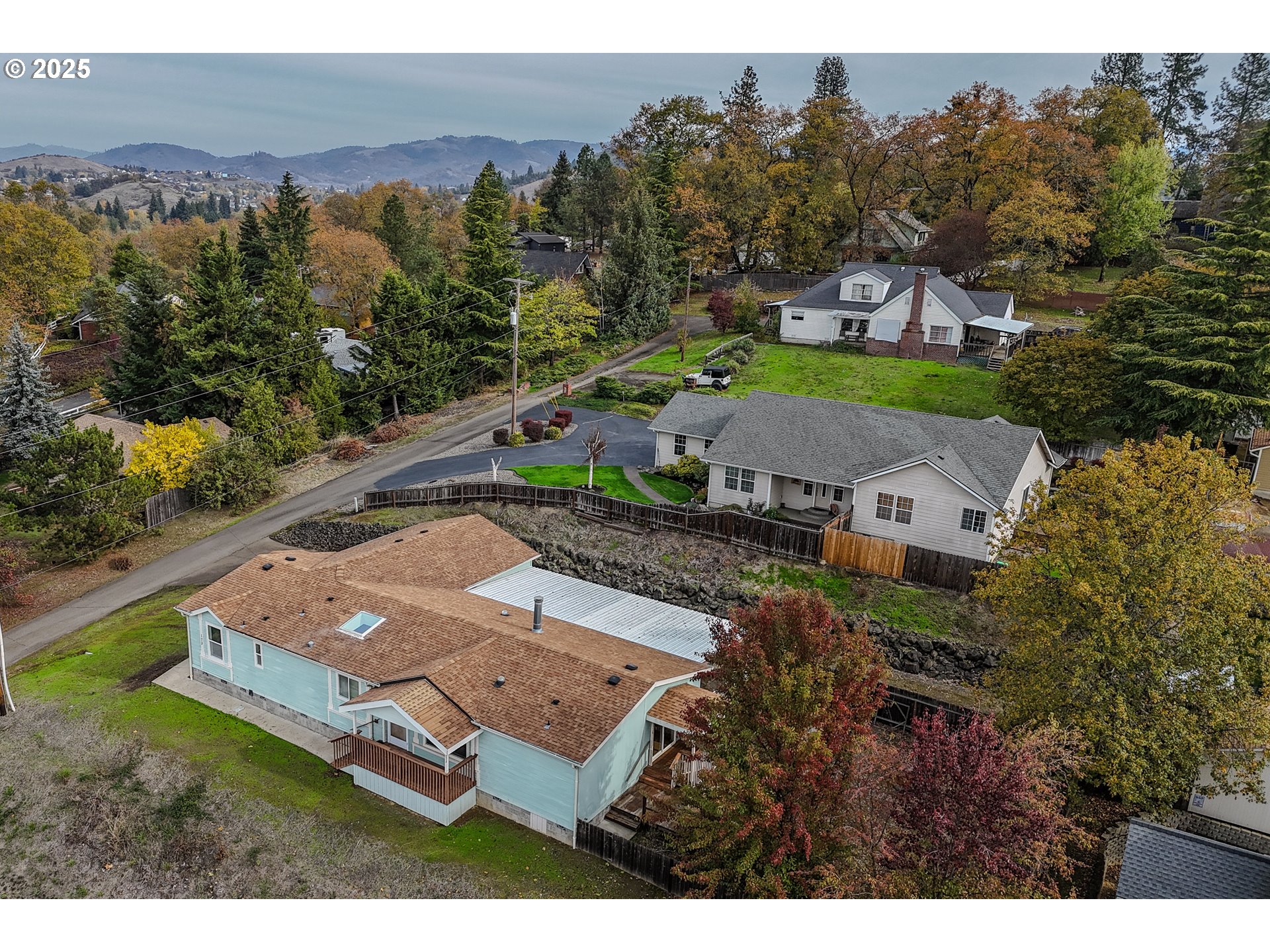 173 North Main Street Winston, OR 97496 - Photo 41 of 45 an aerial view of a house with a yard