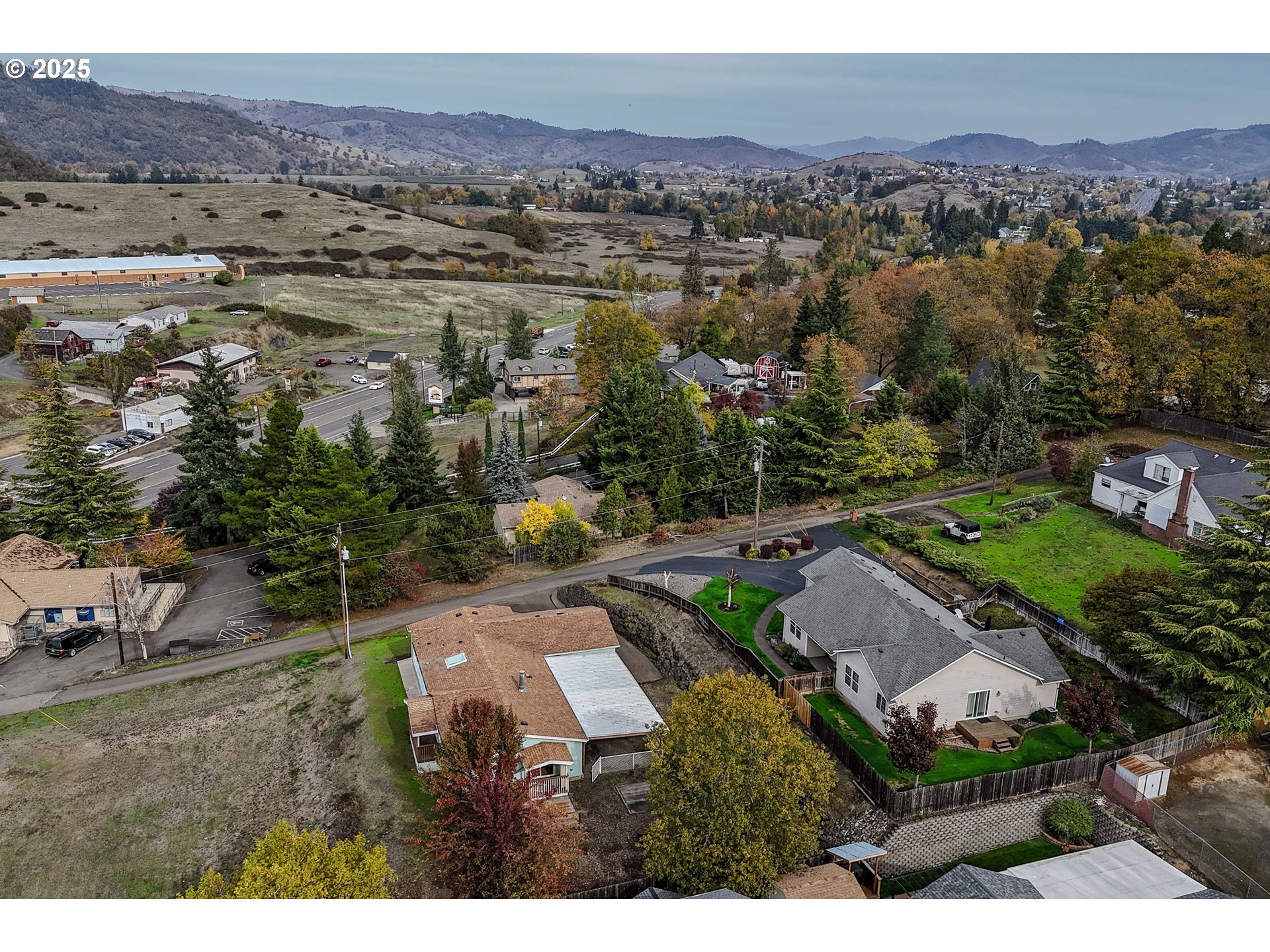 173 North Main Street Winston, OR 97496 - Photo 42 of 45 an aerial view of a house with a garden