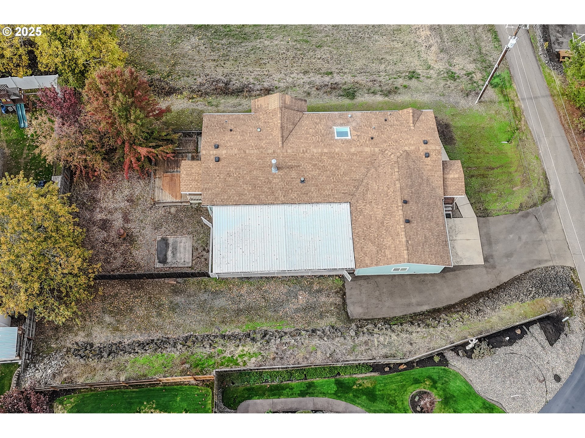 173 North Main Street Winston, OR 97496 - Photo 44 of 45 an aerial view of a house with a yard