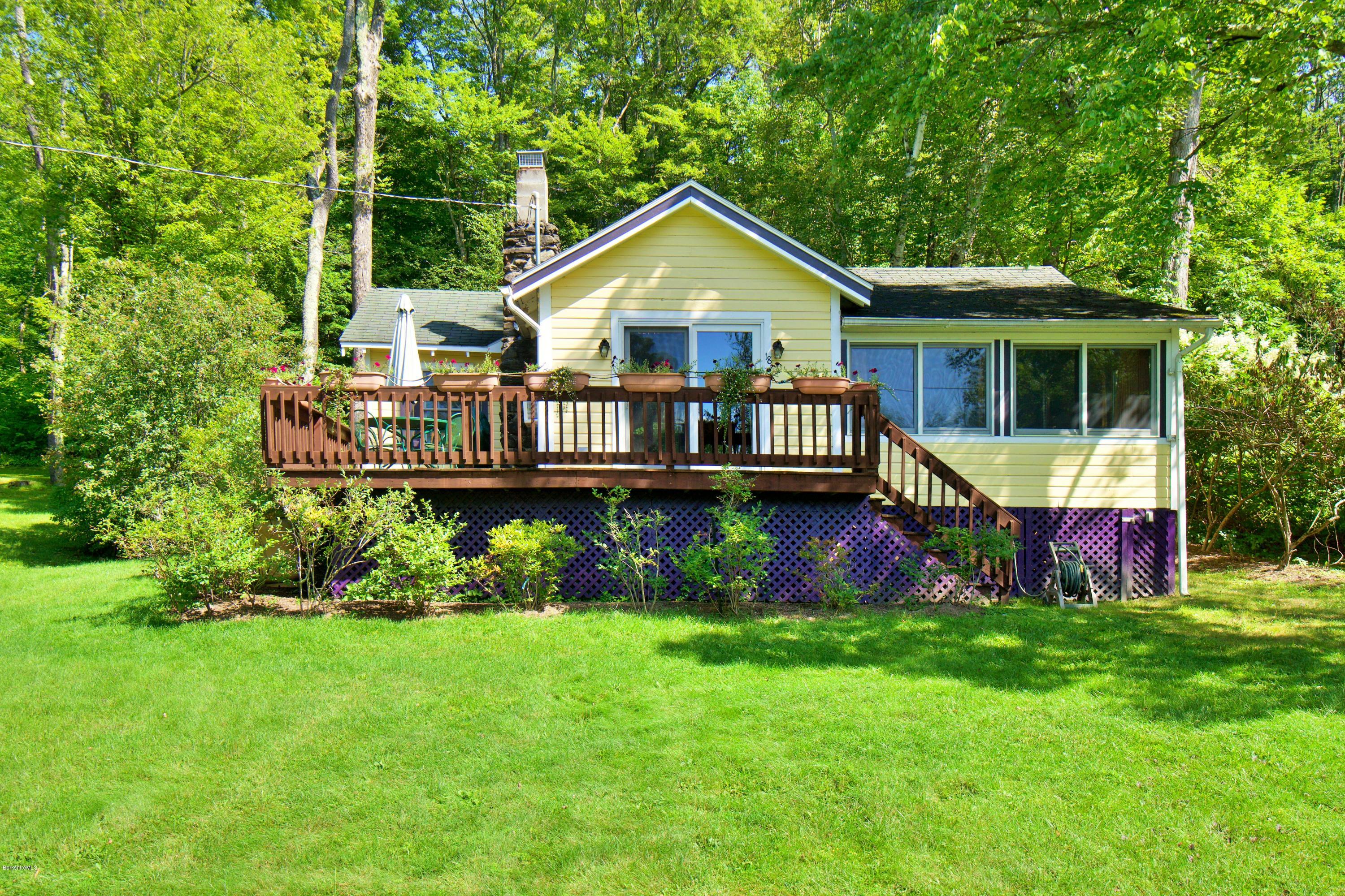 18 Mahkeenac Heights Road Stockbridge, MA 01262 - Photo 1 of 19 a front view of house with yard and green space