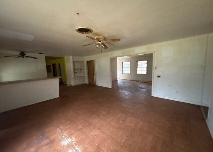 1301 Vauthier Street La Marque, TX 77568 - Photo 12 of 19 a view of a livingroom with a staircase