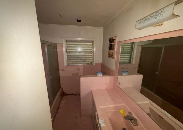 1301 Vauthier Street La Marque, TX 77568 - Photo 19 of 19 a room with storage and utility