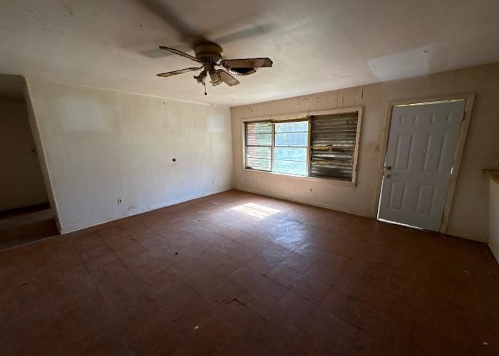 1301 Vauthier Street La Marque, TX 77568 - Photo 9 of 19 a view of an empty room with a window