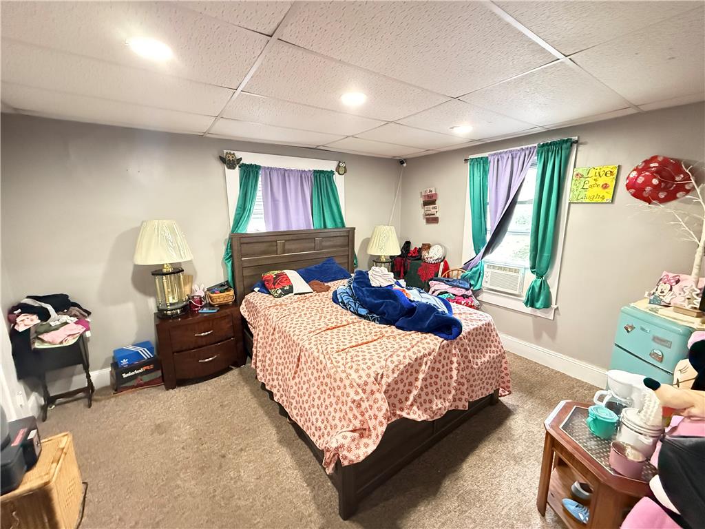 700 Philo Street Scranton, PA 18508 - Photo 17 of 19 A comfortable bedroom featuring practical carpet flooring and a simple ceiling design.