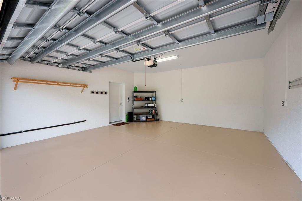 16348 Viansa Way, Unit 101 Naples, FL 34110 - Photo 20 of 34 a view of empty room with storage
