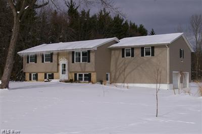 8070 Bainbridge Road Chagrin Falls, OH 44023 - Photo 1 of 1 This home rests on a private three acre setting. The property is a nice blend of open space and woods and would be an ideal horse property.
