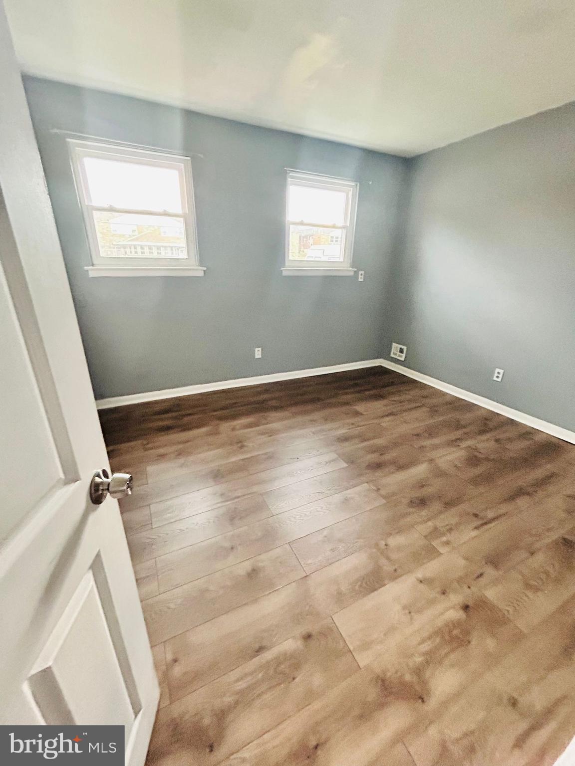 8131 Langdon Street Philadelphia, PA 19152 - Photo 6 of 14 an empty room with windows