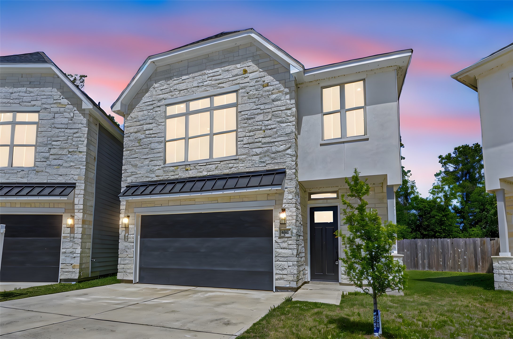 4902 Wunder Way Houston, TX 77069 - Photo 2 of 41 a front view of a house with a garden