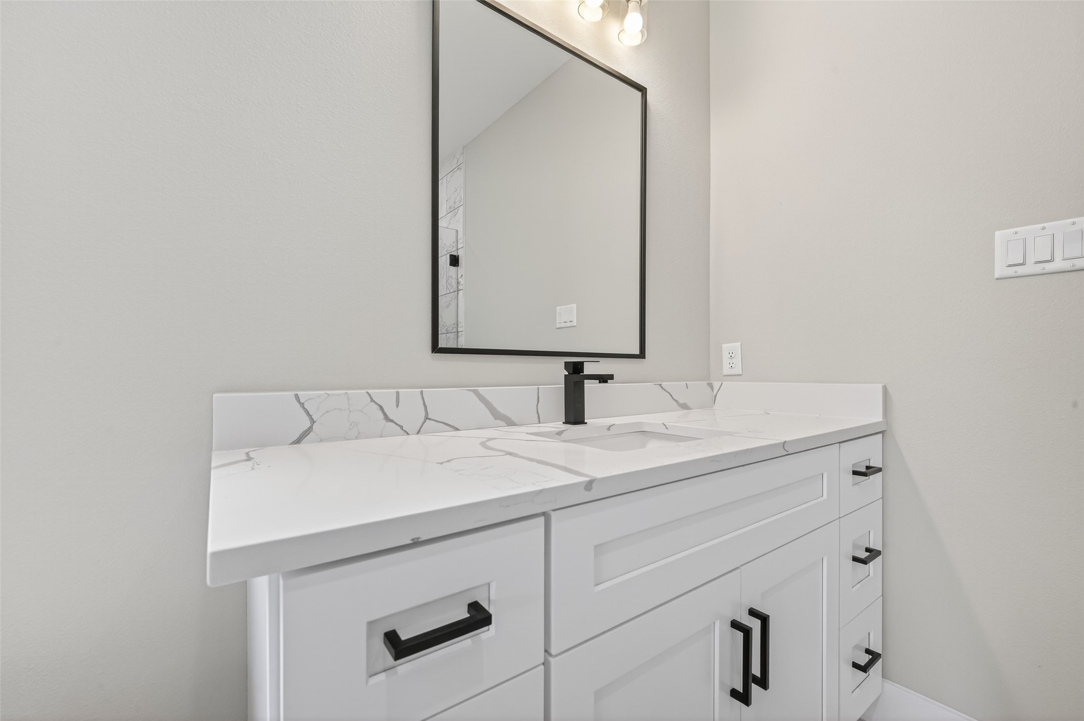 4902 Wunder Way Houston, TX 77069 - Photo 21 of 41 a bathroom with a sink and a mirror