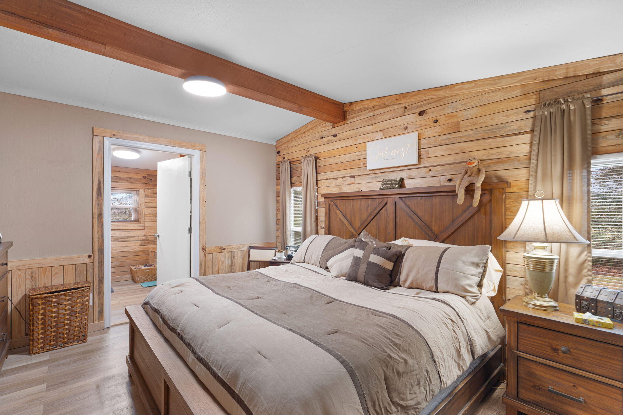 129 Farris Road Cleveland, TN 37323 - Photo 12 of 26 a bedroom with a bed and wooden floor
