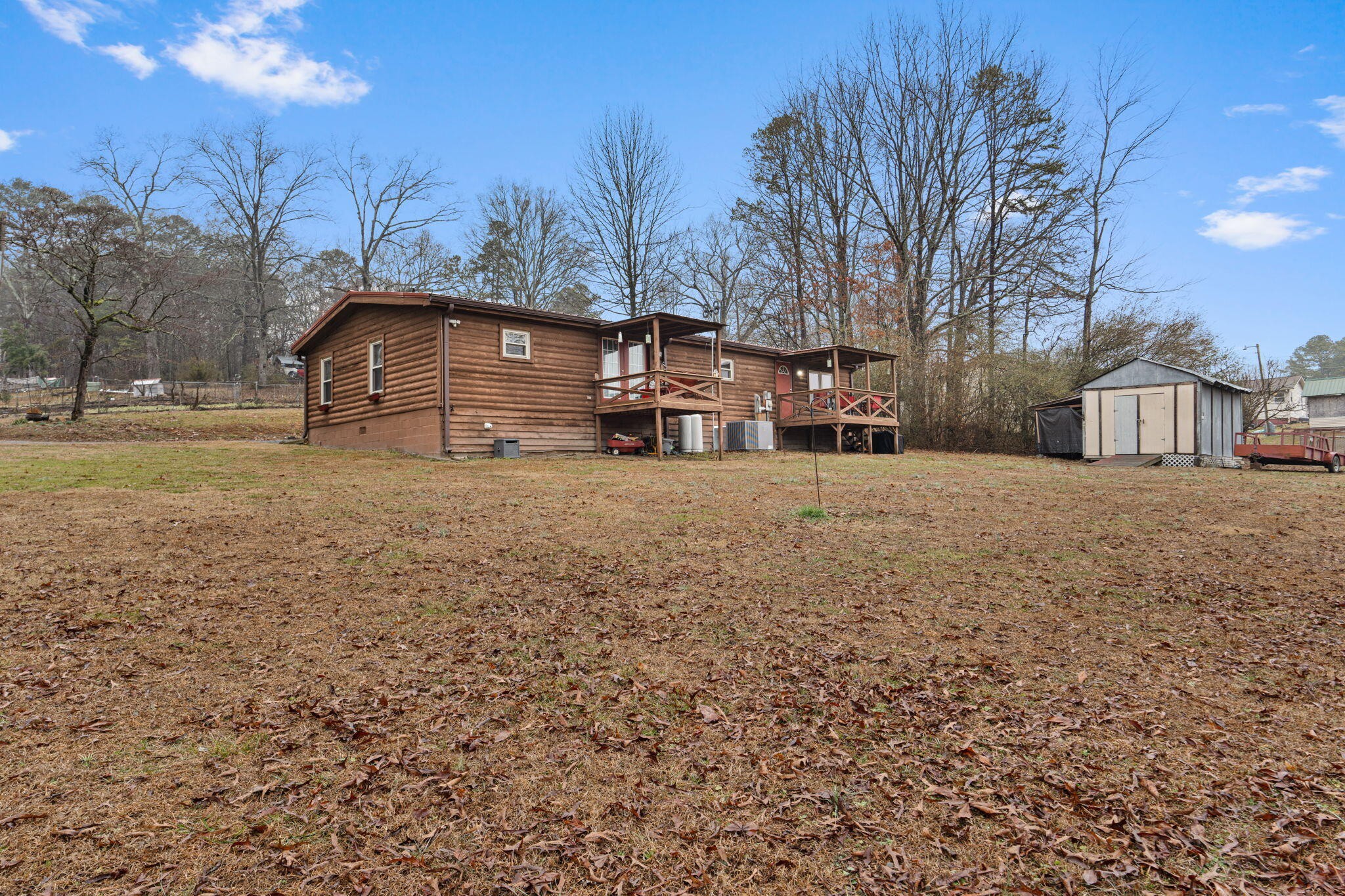 129 Farris Road Cleveland, TN 37323 - Photo 26 of 26 a view of a yard with large trees