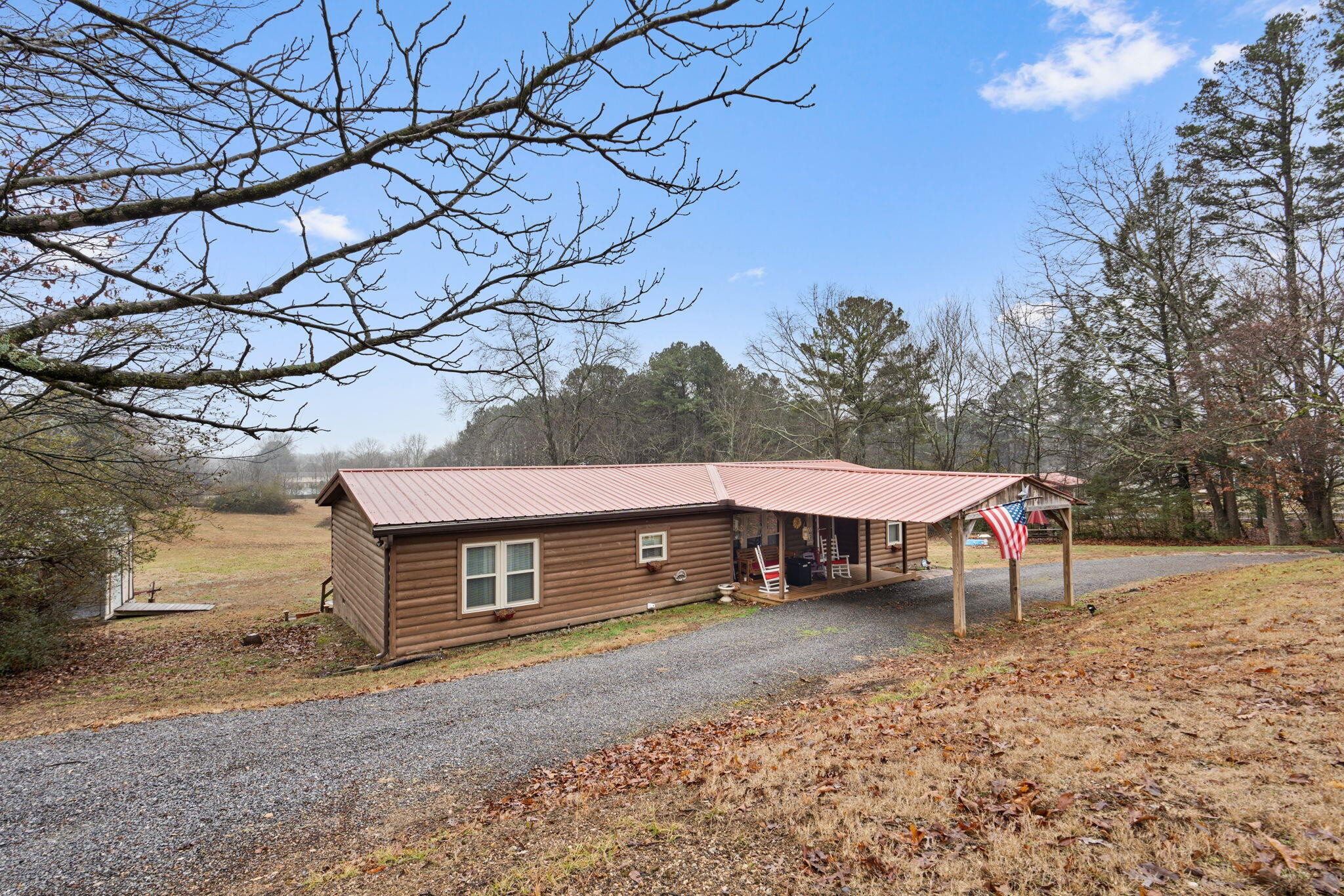 129 Farris Road Cleveland, TN 37323 - Photo 3 of 26 a view of a house with a yard and sitting area