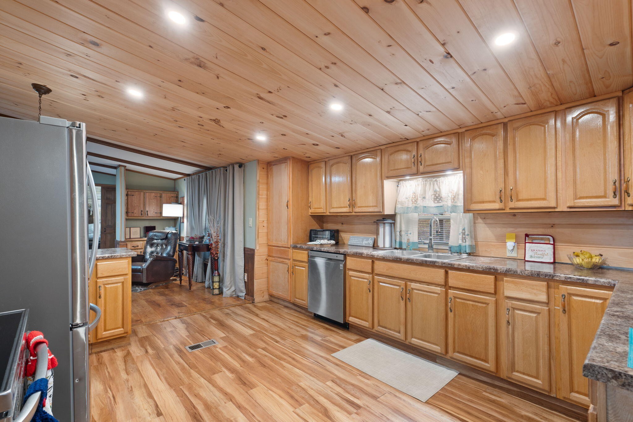 129 Farris Road Cleveland, TN 37323 - Photo 8 of 26 a kitchen with lots of counter top space and wooden floor