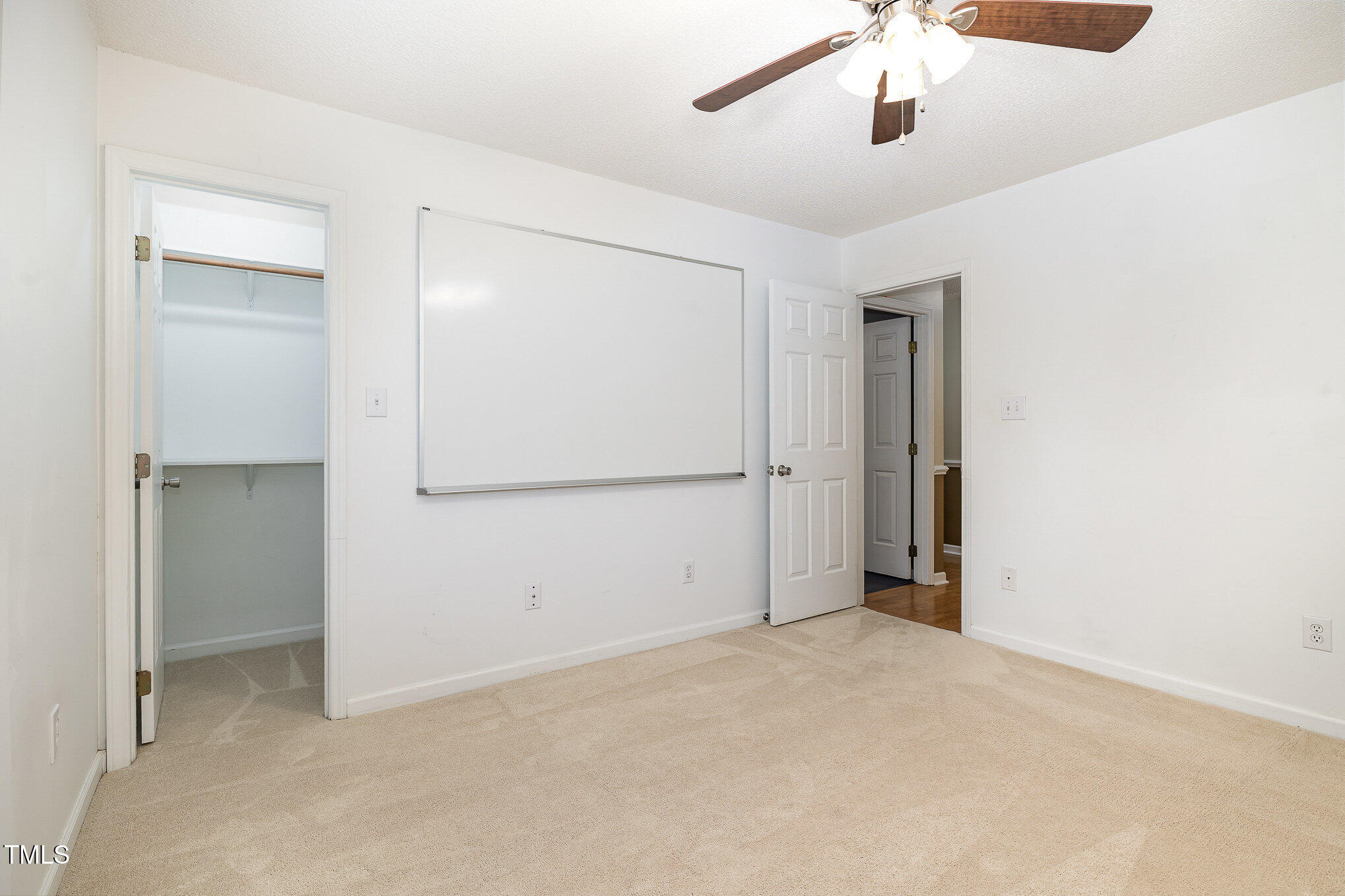 3733 Polenta Road Clayton, NC 27520 - Photo 14 of 51 an empty room with fan
