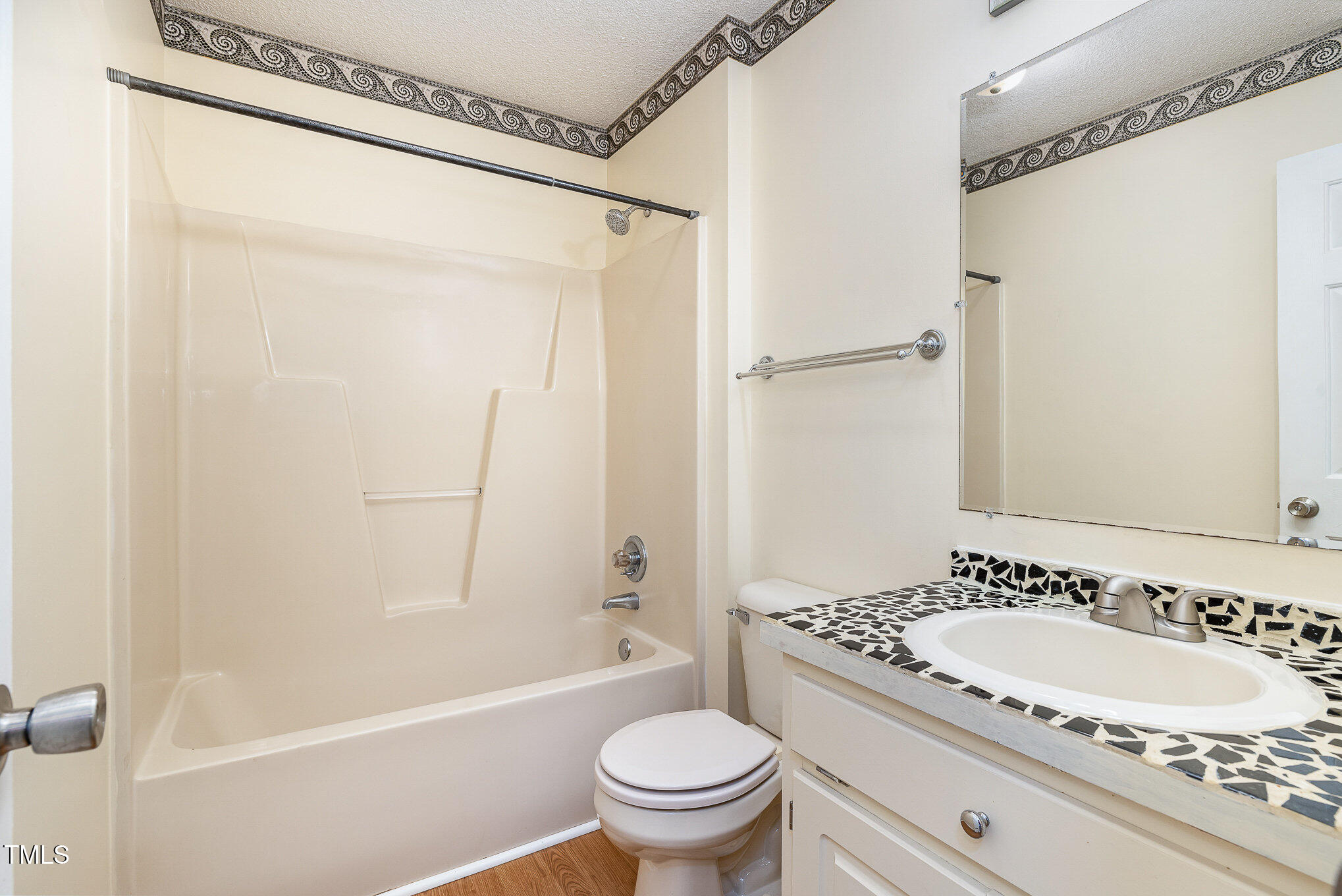 3733 Polenta Road Clayton, NC 27520 - Photo 20 of 51 a bathroom with a granite countertop sink toilet and shower