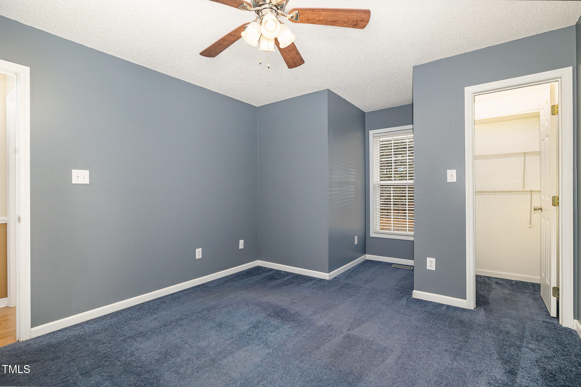 3733 Polenta Road Clayton, NC 27520 - Photo 21 of 51 an empty room with windows and closet