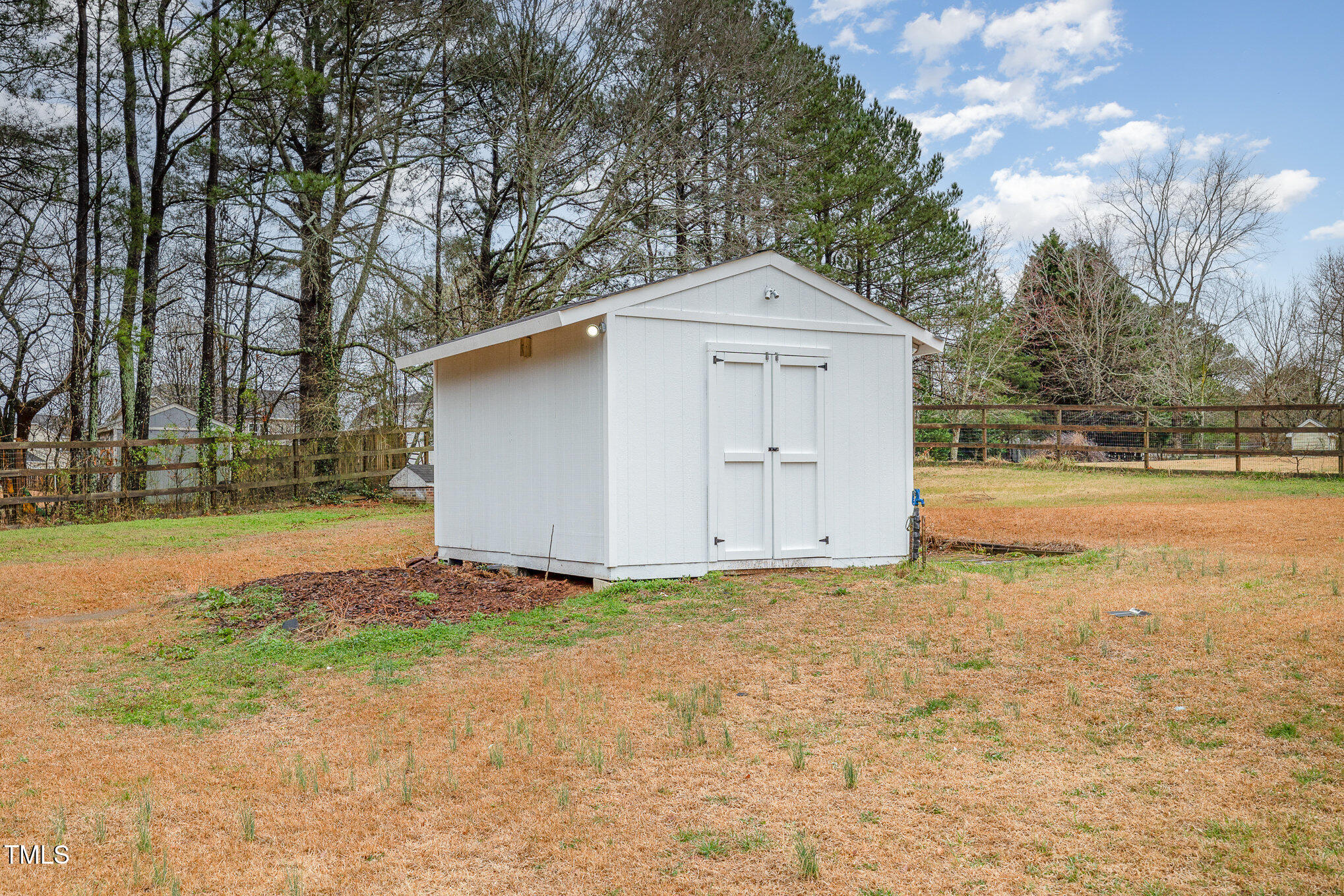 3733 Polenta Road Clayton, NC 27520 - Photo 30 of 51 a view of a house with a yard