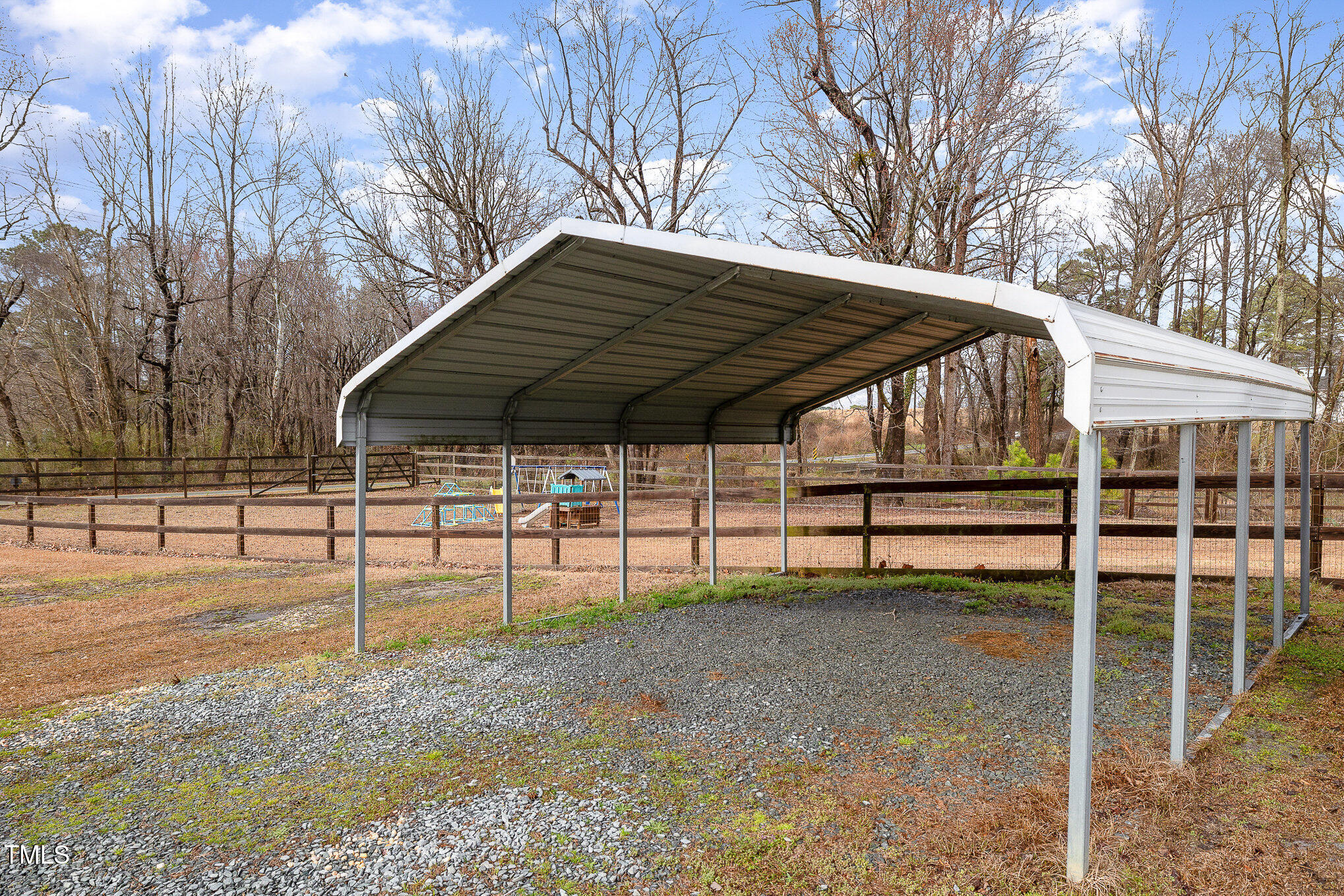 3733 Polenta Road Clayton, NC 27520 - Photo 32 of 51 a backyard of a house with table and chairs